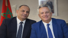 بين خطابين… كريم زيدان يقطر الشمع على مزور في ملف الجالية المغربية