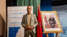 الأمن الوطني يحتفي بموظفه بوبكر لمليتي بعد فوزه بجائزة بلند الحيدري للشعراء الشباب